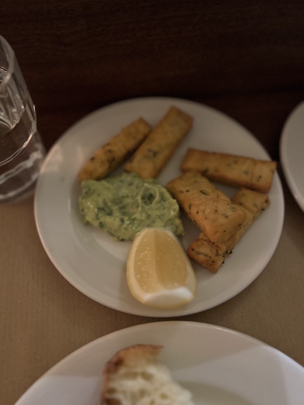 Panelle served with herb aioli and lemon